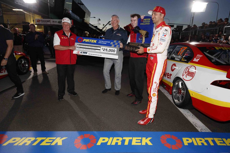 EV11-17-13125-Pirtek-CEO-Stephen-Dutton-in-Blue-handing-over-cheque-to-Dick-Johnson_web-960x640